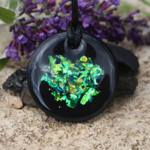 Shungite flat Solid Stone with Beautiful Unique Dichroic sparkle by Oraphim 35mm Style Pendant Polished with Oraphim silver activated shungite powder added to one side to expand the frequency range to be made bio-compatible to include wifi & 5G Vegan thong included Italian Tarnish Resistant Sterling Silver chain Upgrade is available here: (https://www.etsy.com/uk/Oraphim/listing/835279927/sterling-silver-chain-upgrade-to-your?utm_source=Copy&utm_medium=ListingManager&utm_campaign=Share&utm_term=so.lmsm&share_time=1615479266639) We have conducted human body electrical field kerlian photography experiments of our silver infused shungite which show the rapid beneficial change to the wearer Oraphim Study the work with shungite by Nancy L Hopkins, Regina Martino, Grigory Andrievsky & Nina Kolesnikova and her team who work in the medical setting environment treating patients with shungite.