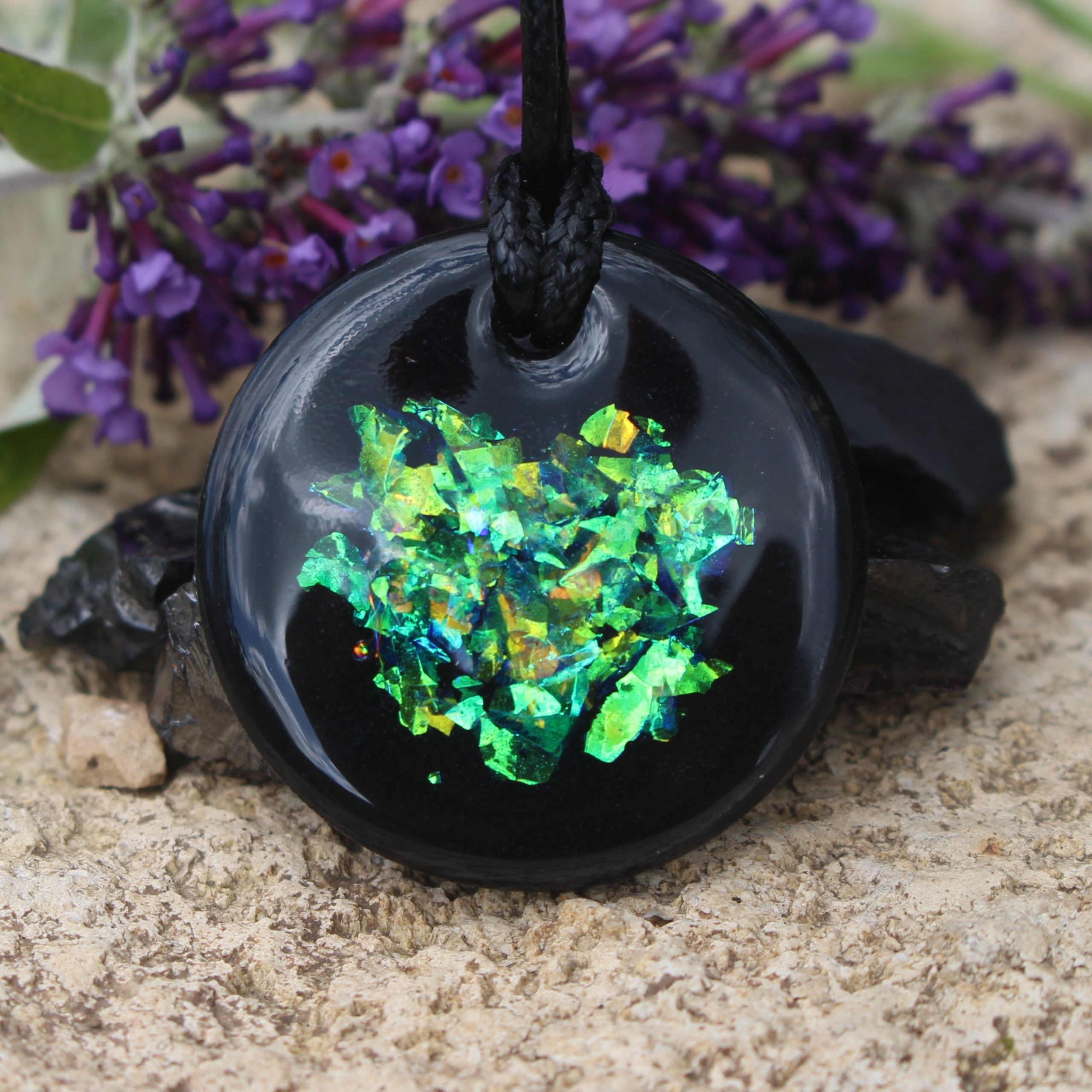 IMG_9680 (2) Shungite flat Solid Stone with Beautiful Unique Dichroic sparkle by Oraphim 35mm Style Pendant Polished with Oraphim silver activated shungite powder added to one side to expand the frequency range to be made bio-compatible to include wifi & 5G Vegan thong included Italian Tarnish Resistant Sterling Silver chain Upgrade is available here: (https://www.etsy.com/uk/Oraphim/listing/835279927/sterling-silver-chain-upgrade-to-your?utm_source=Copy&utm_medium=ListingManager&utm_campaign=Share&utm_term=so.lmsm&share_time=1615479266639) We have conducted human body electrical field kerlian photography experiments of our silver infused shungite which show the rapid beneficial change to the wearer Oraphim Study the work with shungite by Nancy L Hopkins, Regina Martino, Grigory Andrievsky & Nina Kolesnikova and her team who work in the medical setting environment treating patients with shungite.